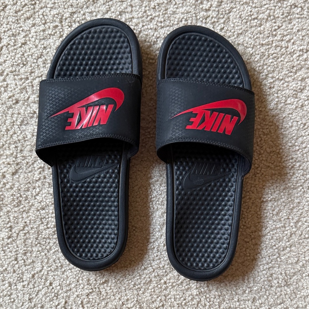 Nike Black Slides with Red Swoosh Logo